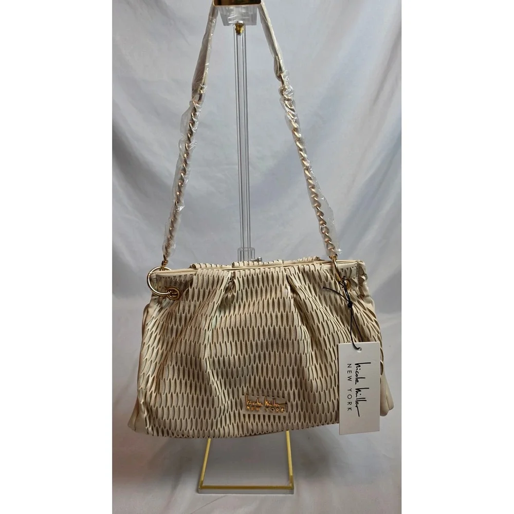 Nicole Miller New York Cream Laser Cut Baguette Shoulder Bag NWT  Hobo Shoulder